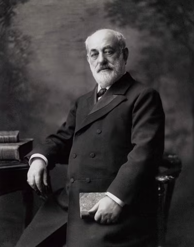 Black and wite photo of a man in a chair