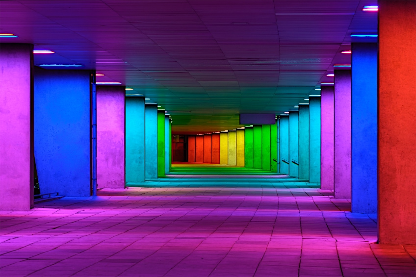 Hallway shown full of colorful walls 
