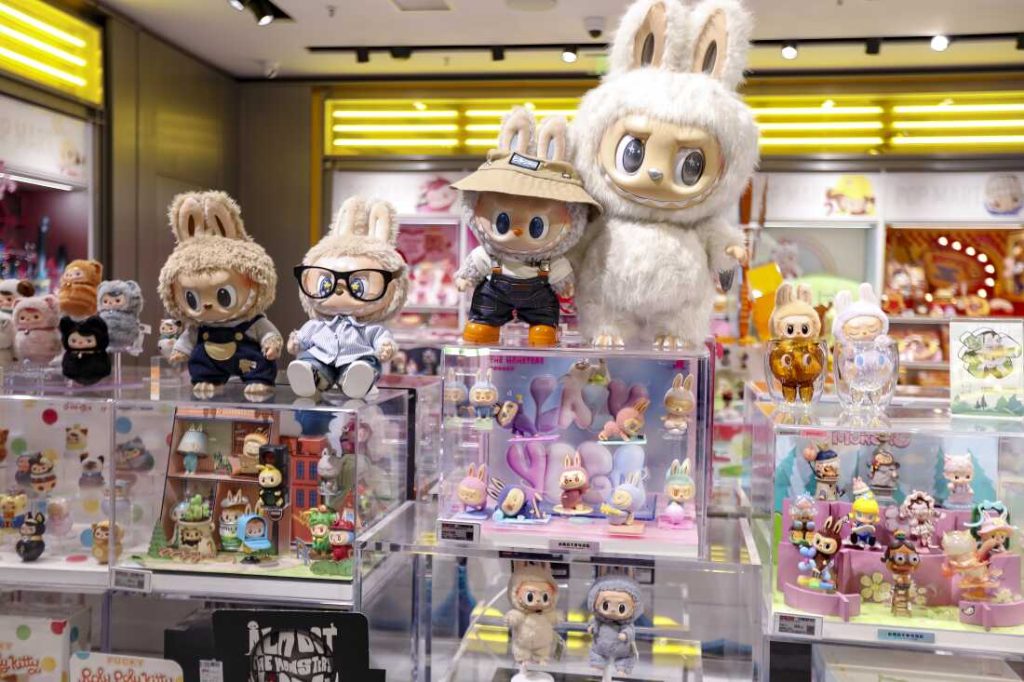 SHANGHAI, CHINA - JUNE 09: Labubu figures and dolls are seen on display at a Pop Mart store on June 9, 2025 in Shanghai, China. From Southeast Asia and Europe to the United States and the Middle East, Labubu - the beloved character from Chinese toy company Pop Mart - is taking the world by storm. (Photo by VCG/VCG via Getty Images)