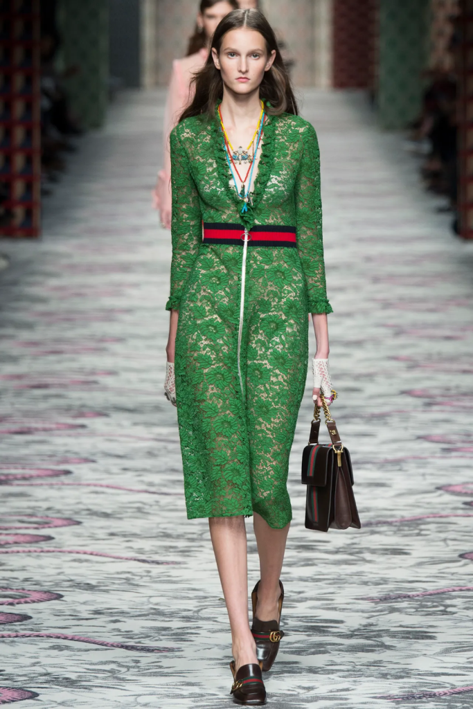 Gucci fasion model on runway wearing green dress