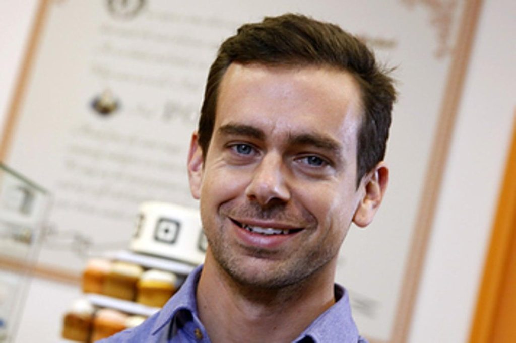 headshot of a man with brown hair